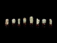 Eight Chinese Celadon Jade Figures of Boys