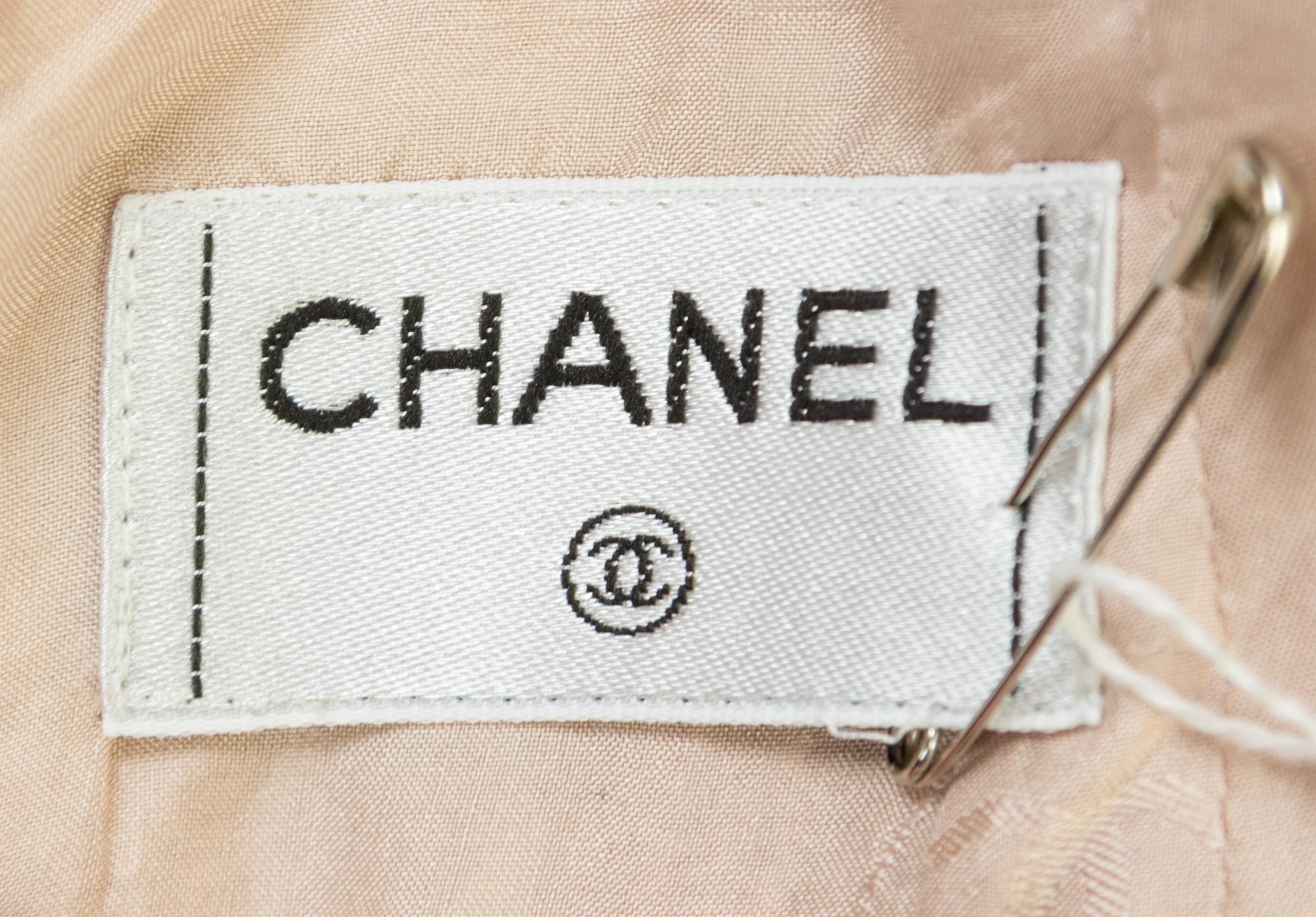 A Chanel Peach Tweed Boucle Skirt Suit, Size 36.