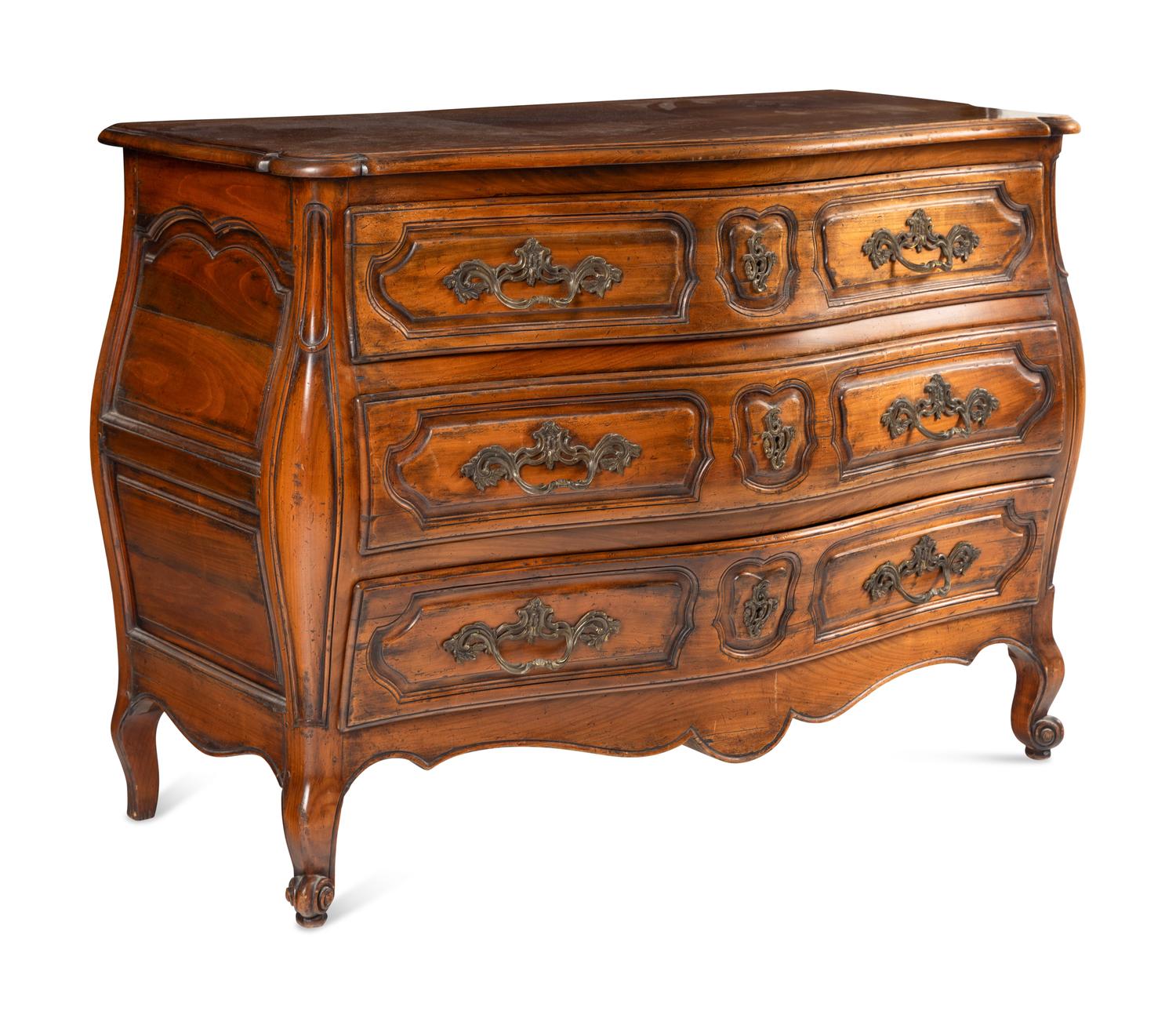 A Louis XV Style Walnut Bombe Commode
