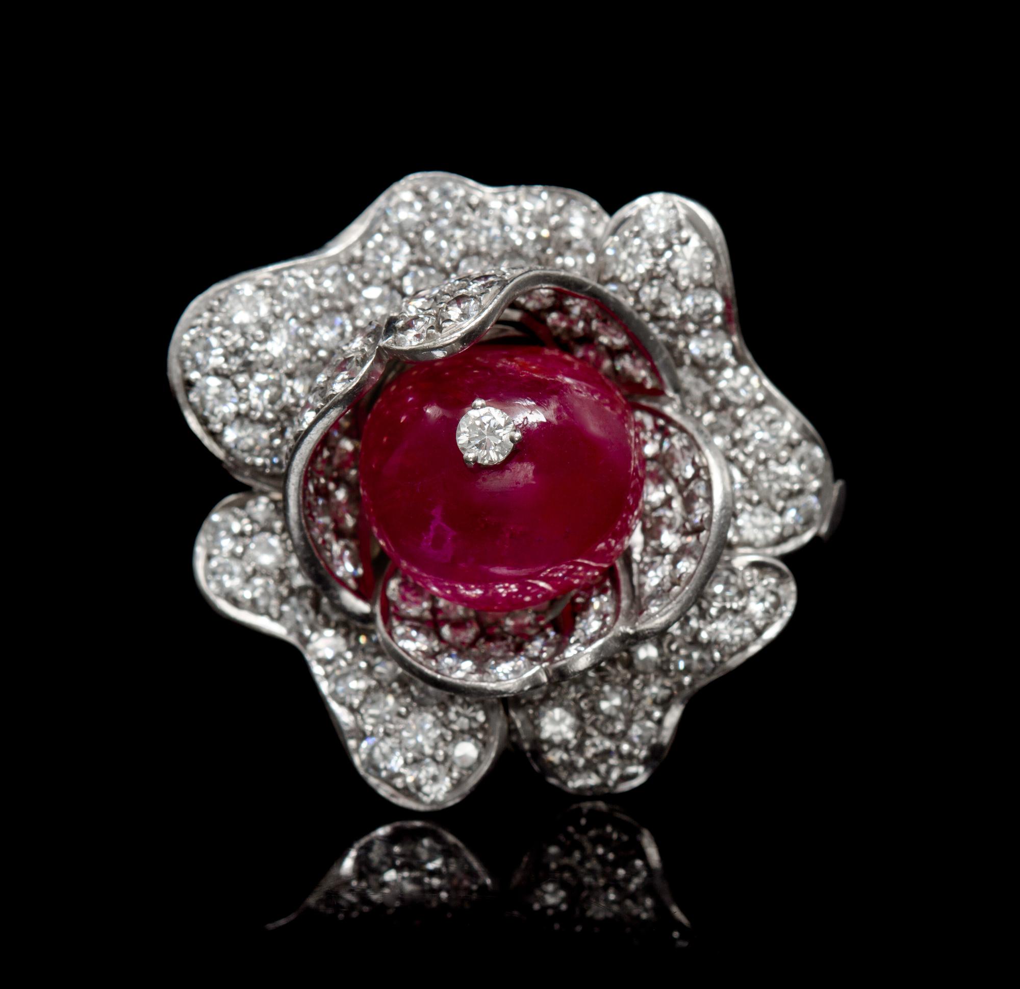 A Platinum, Ruby and Diamond Pendant/Brooch, 12.70 dwts.