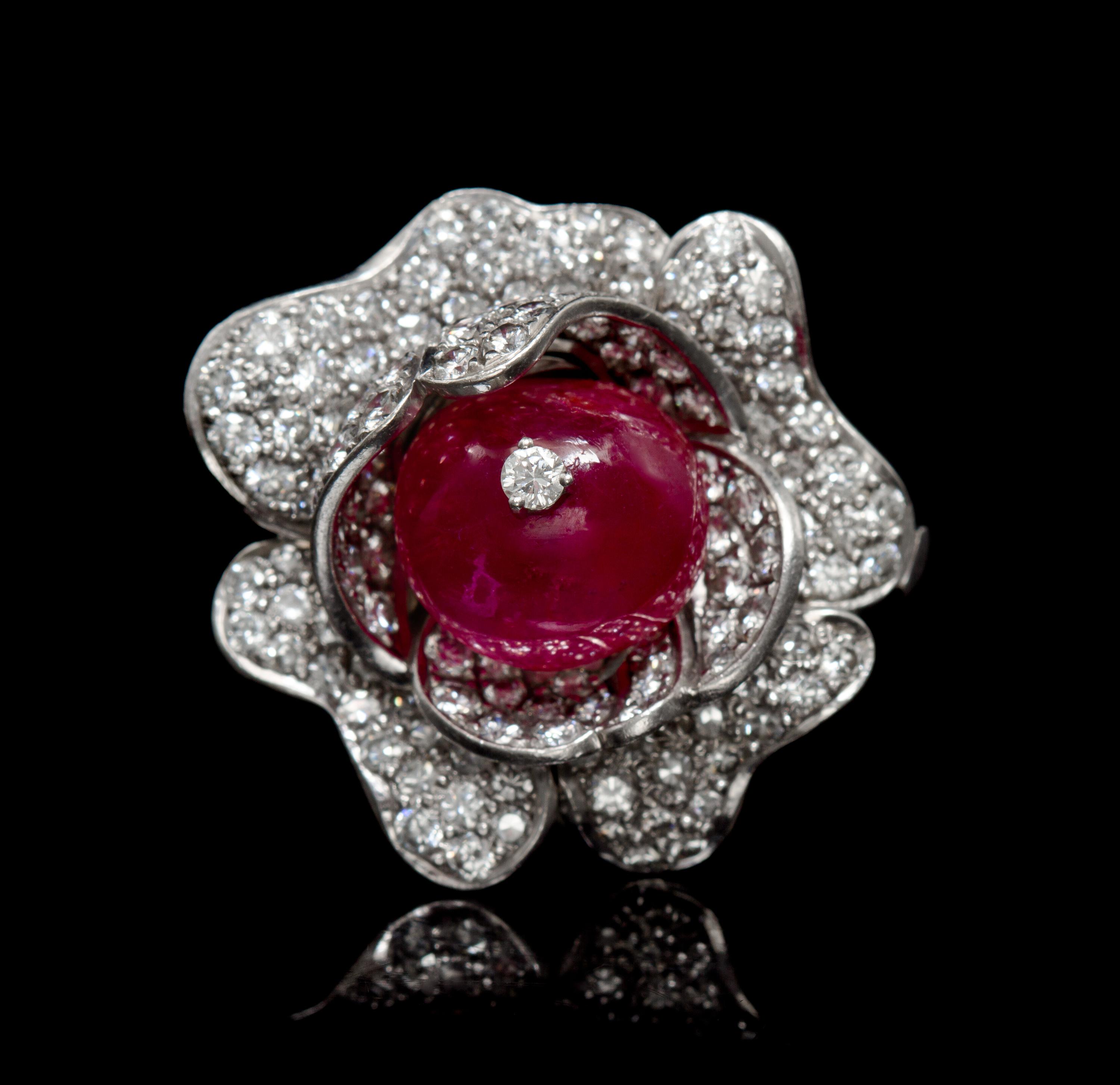 A Platinum, Ruby and Diamond Pendant/Brooch, 12.70 dwts.