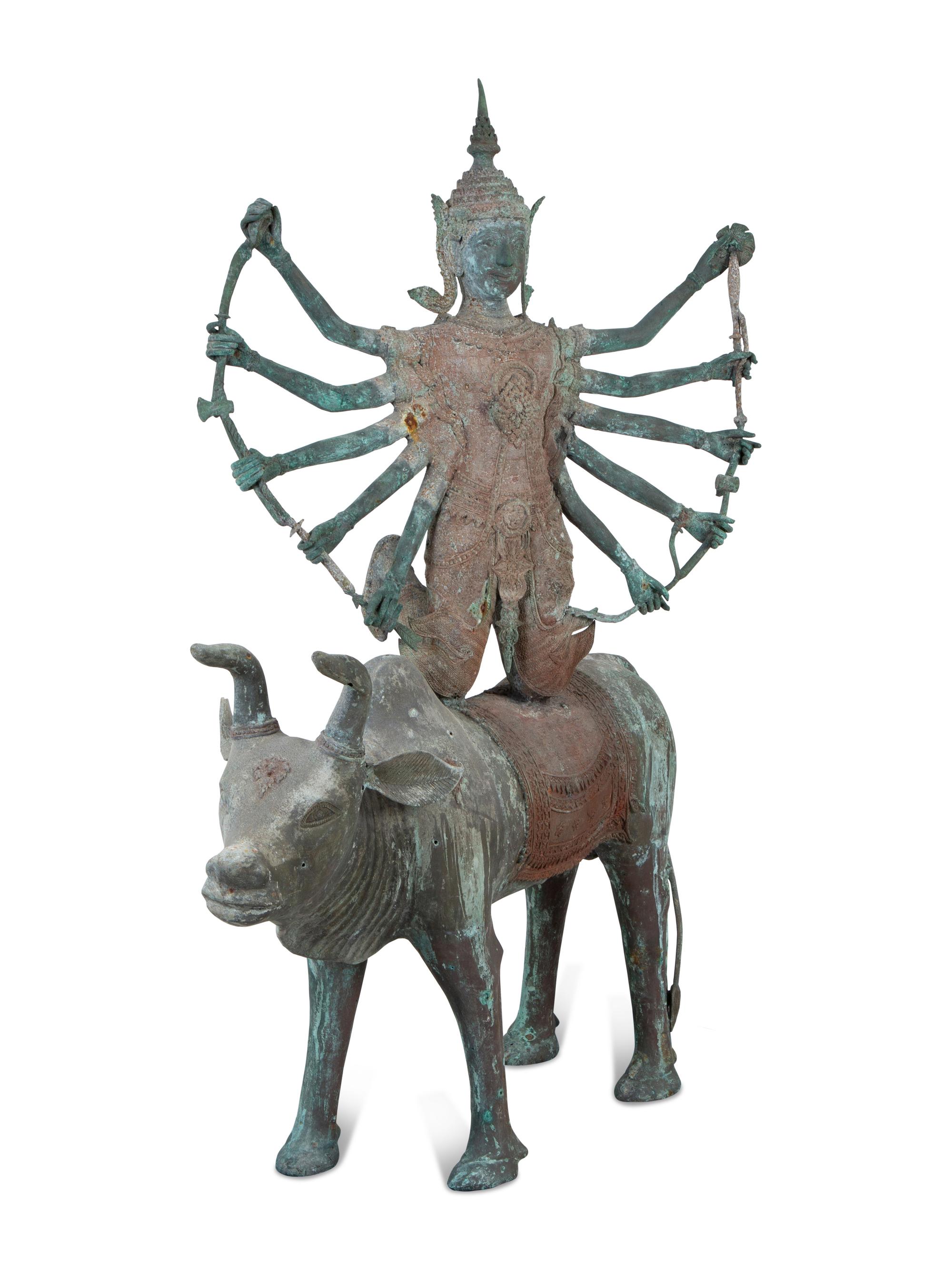 A Tibetan Bronze Durga on Bull — 20TH CENTURY