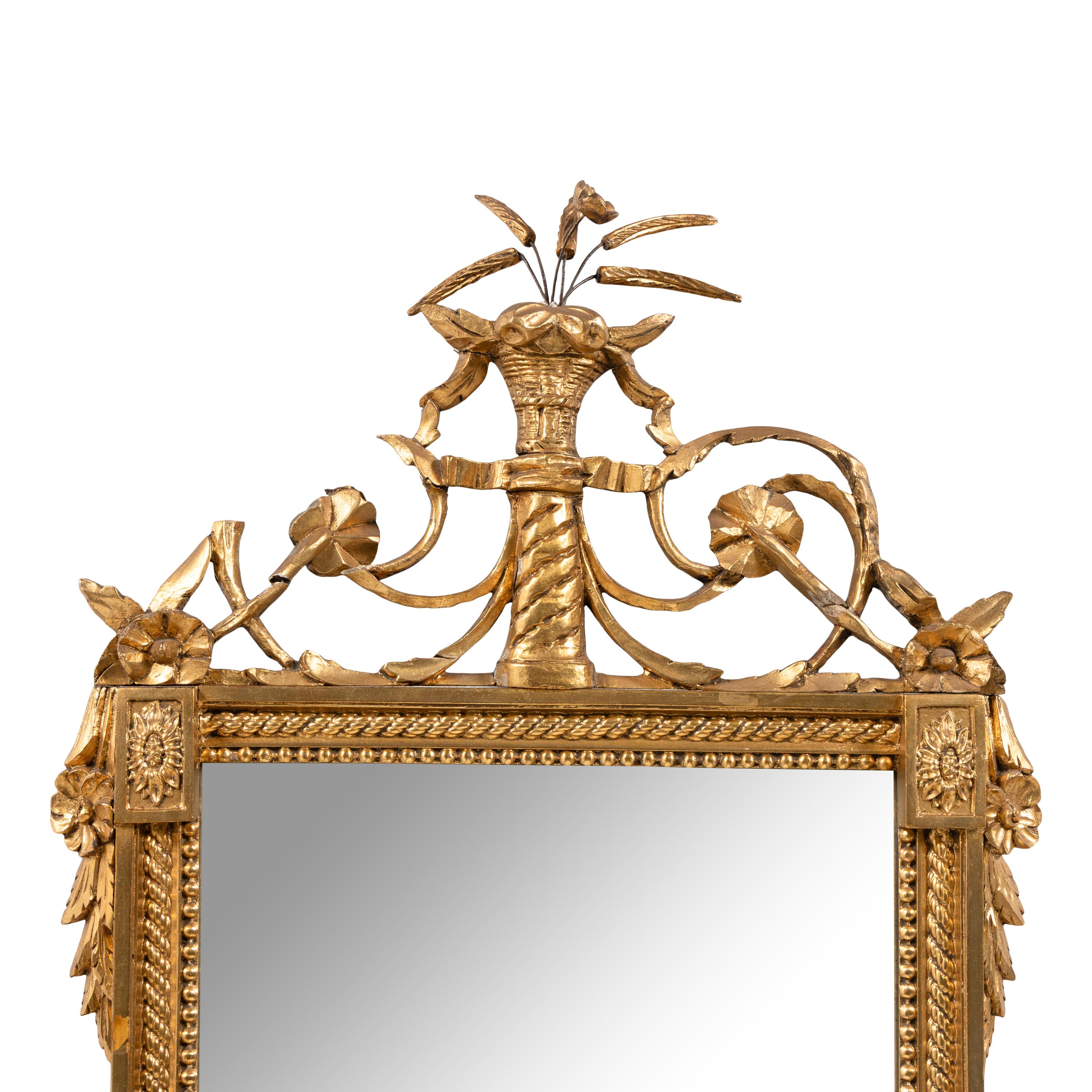 A Regency Style Carved Giltwood Mirror