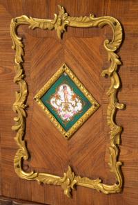 A Louis XV Style Porcelain and Bronze Mounted Tulipwood Veneered Hanging Étagère