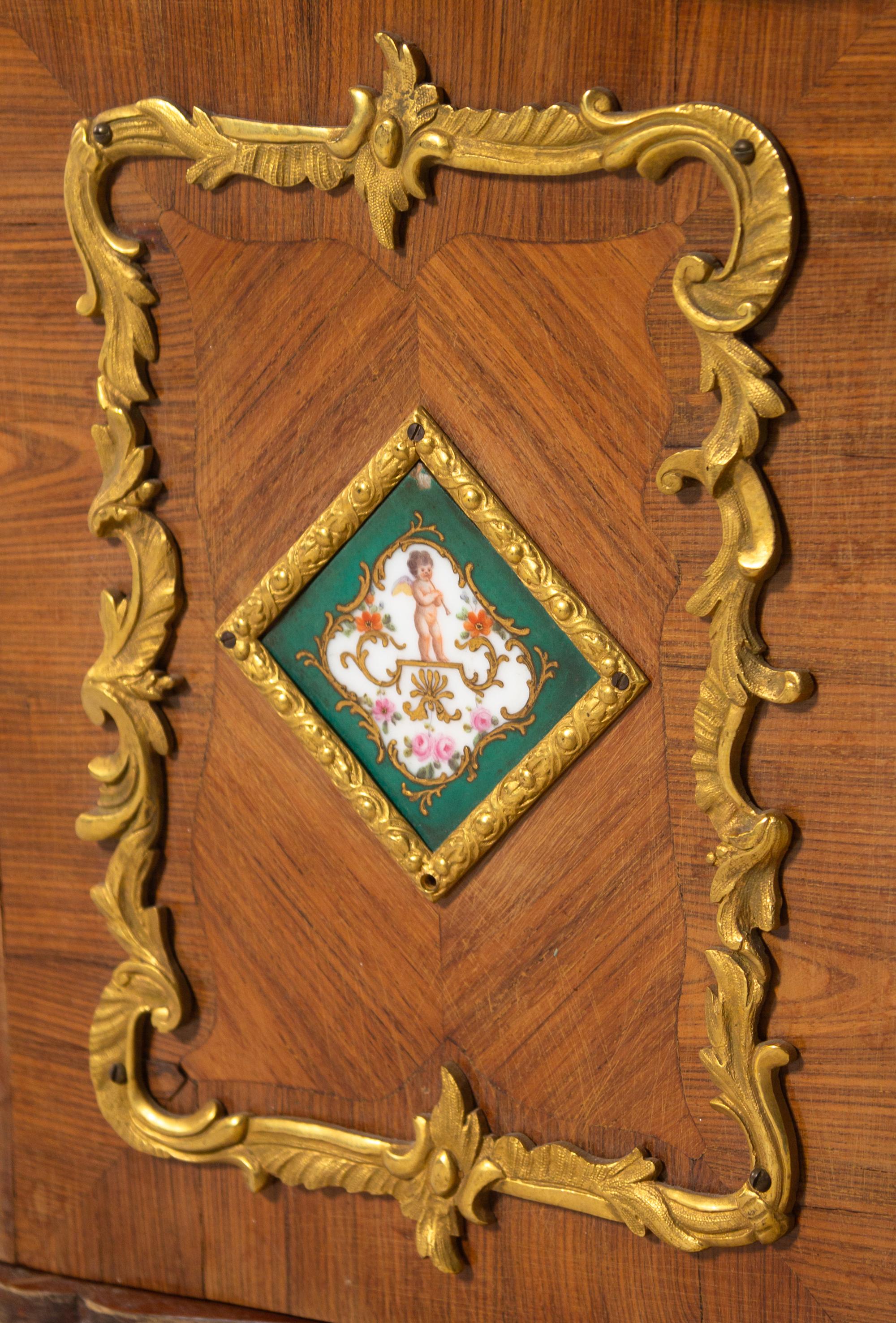 A Louis XV Style Porcelain and Bronze Mounted Tulipwood Veneered Hanging Étagère