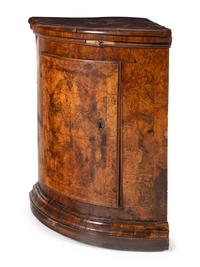 A Pair of North Italian Walnut Corner Cupboards