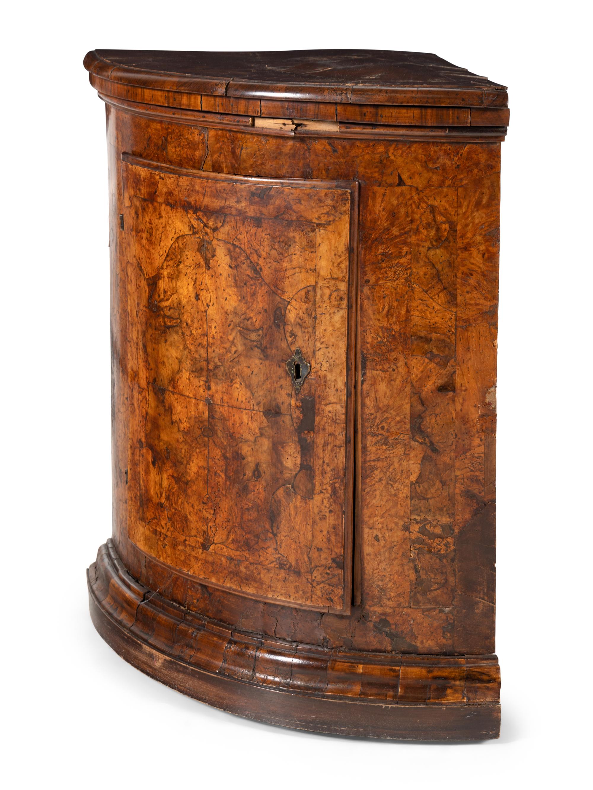 A Pair of North Italian Walnut Corner Cupboards