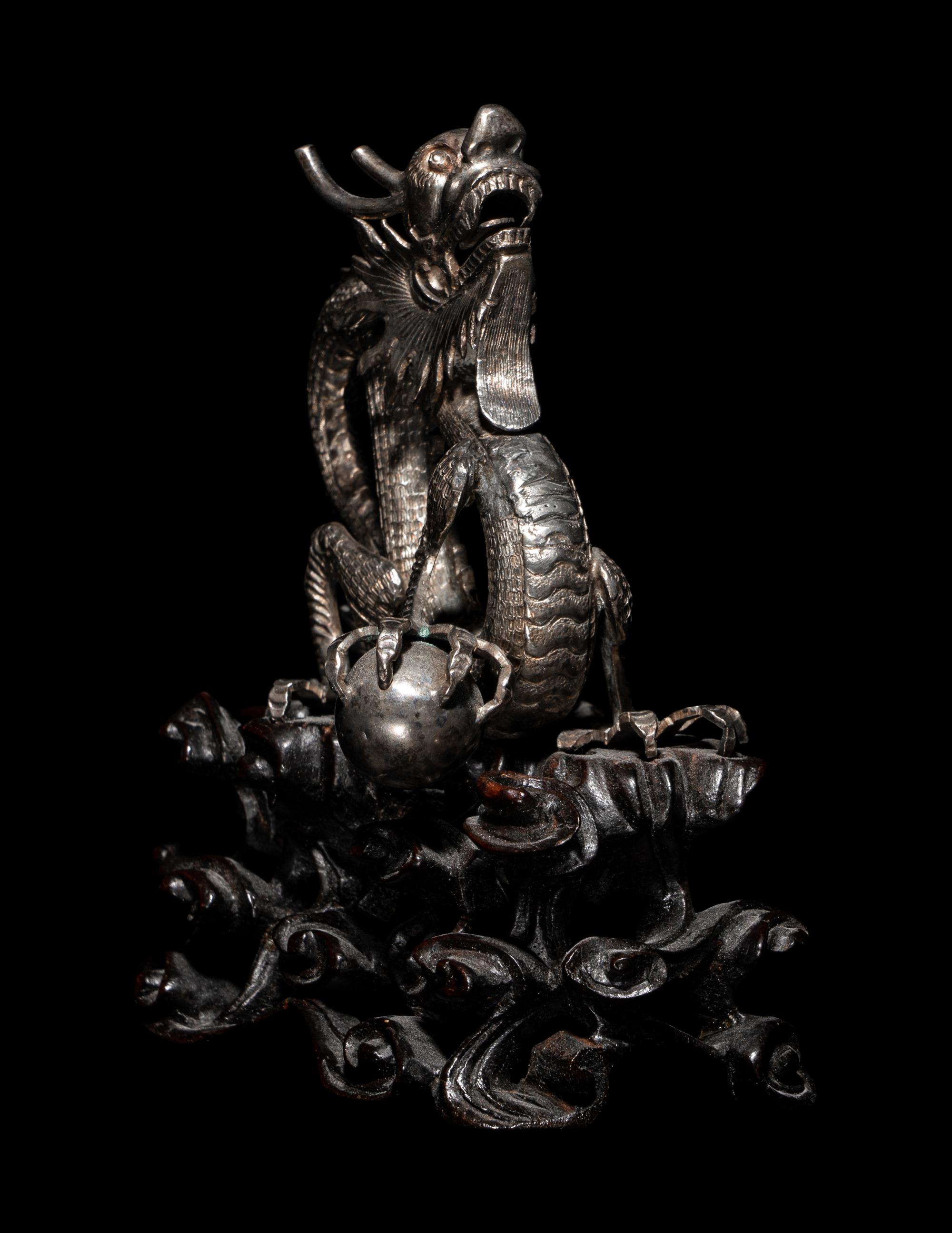A Chinese Silver Dragon