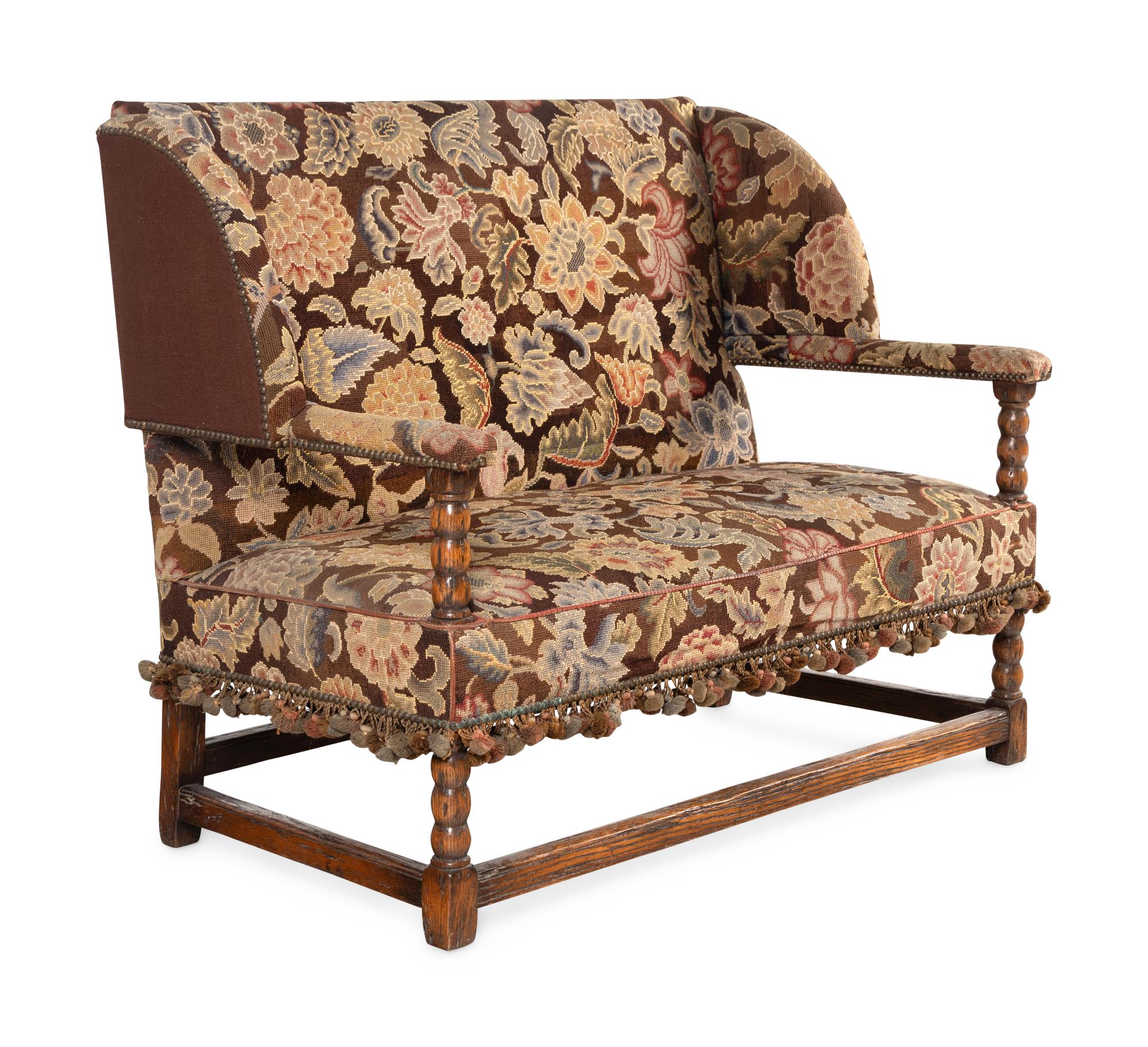 A French Oak and Gros Point Upholstered Wingback Settee