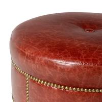 A Leather Upholstered Ottoman