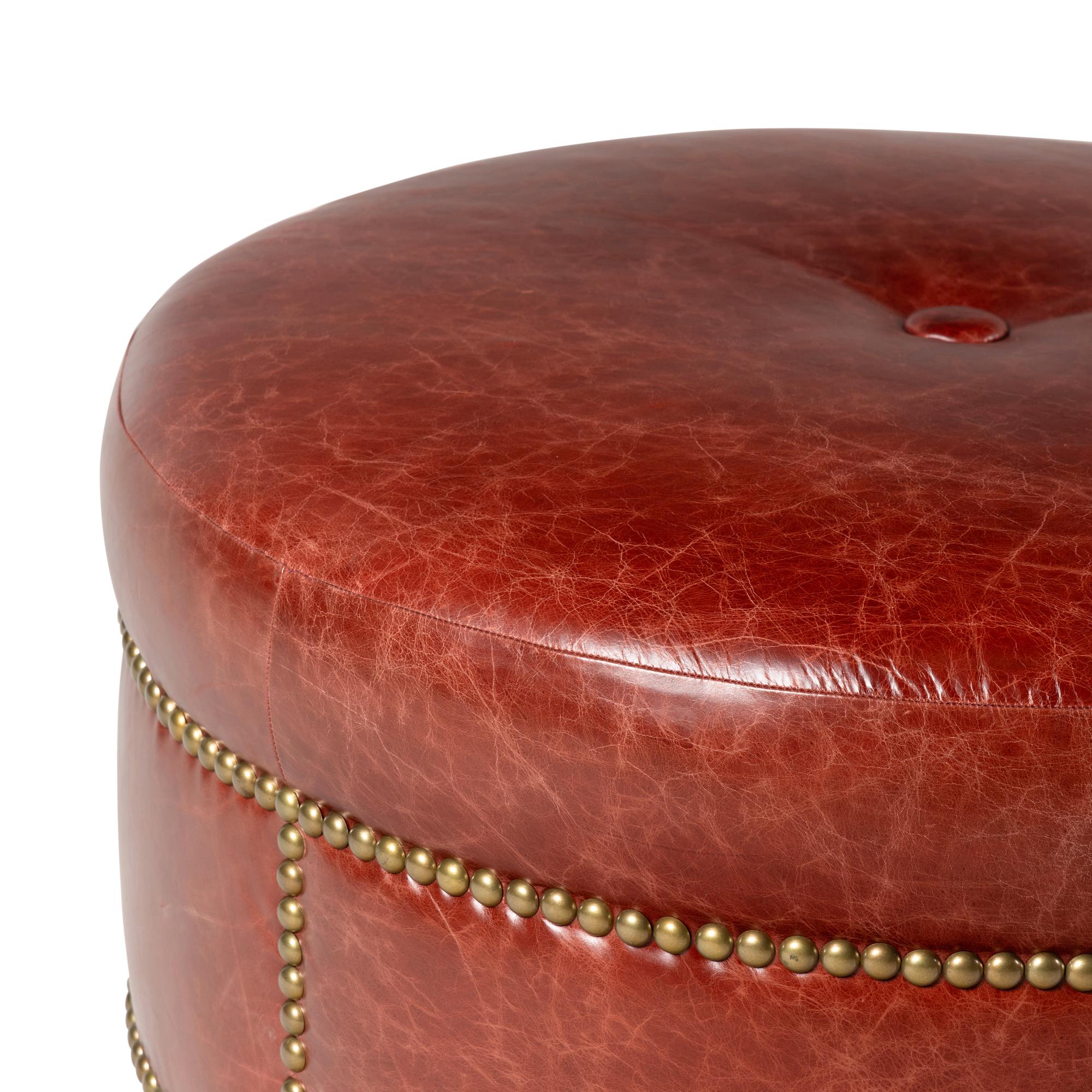 A Leather Upholstered Ottoman