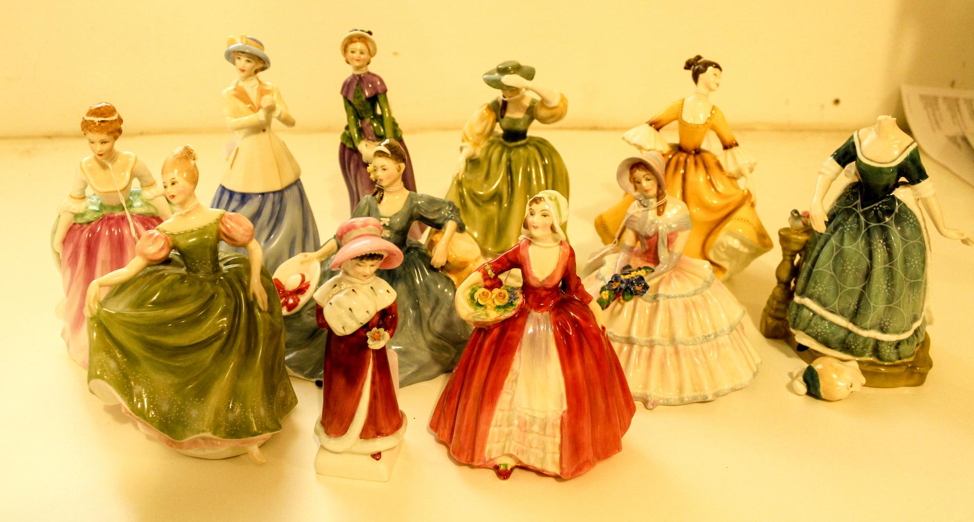 A Set of 11 Royal Doulton Figures Height 8 inches. — 20TH CENTURY