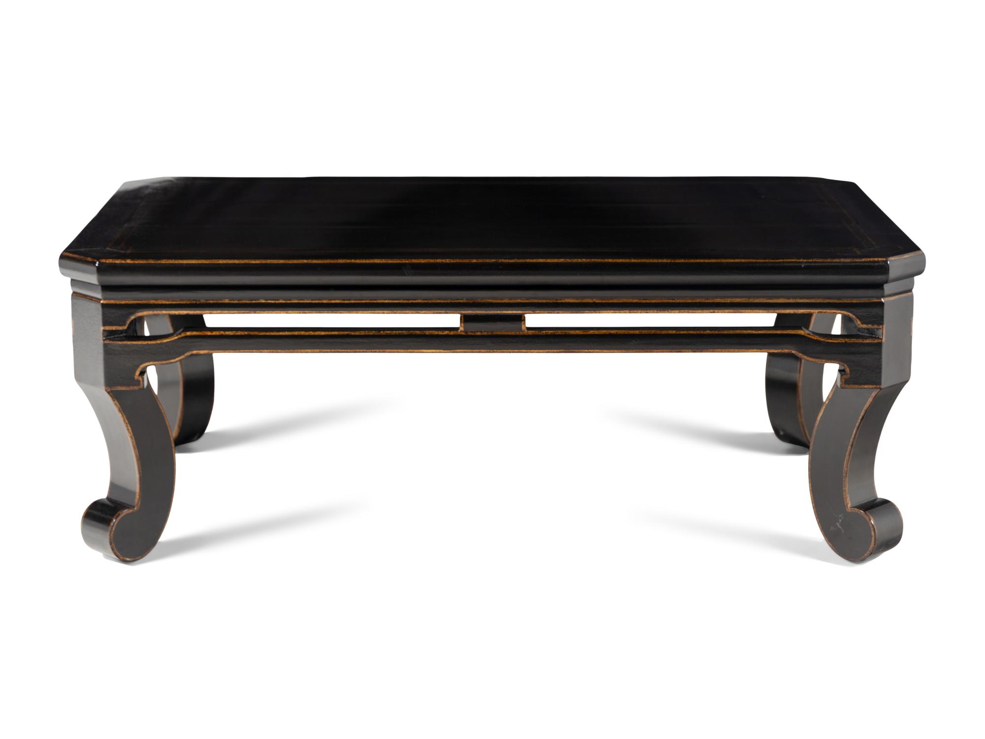 A Contemporary Black Lacquered and Parcel Gilt Low Table