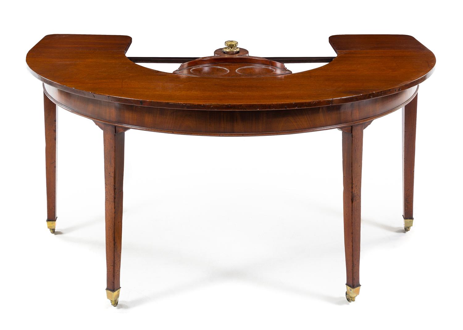 A George III Mahogany Wine Tasting Table Height 28 3/4 x width 60 x depth 30 1/4 inches (closed). — EARLY 19TH CENTURY