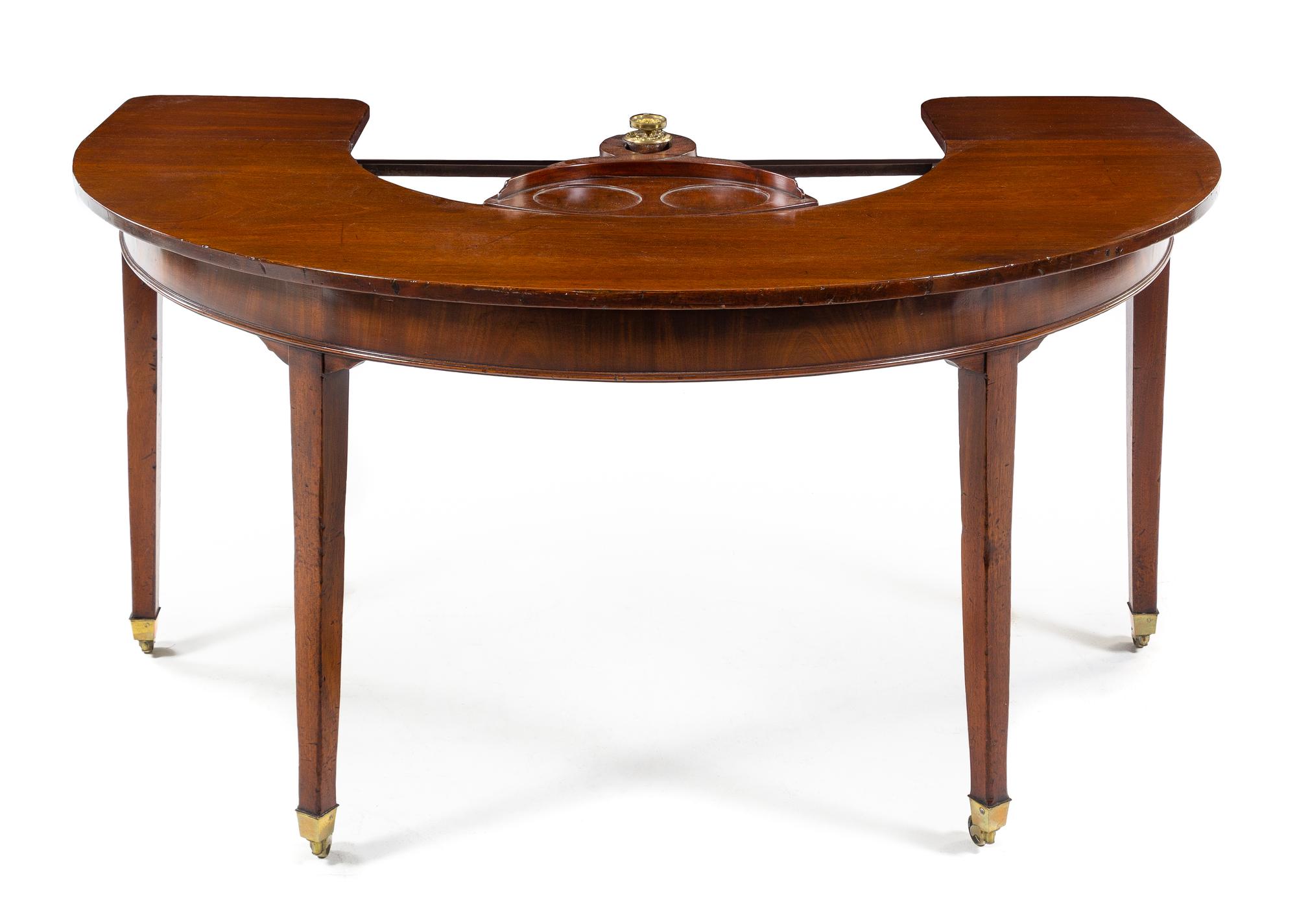 A George III Mahogany Wine Tasting Table Height 28 3/4 x width 60 x depth 30 1/4 inches (closed). — EARLY 19TH CENTURY