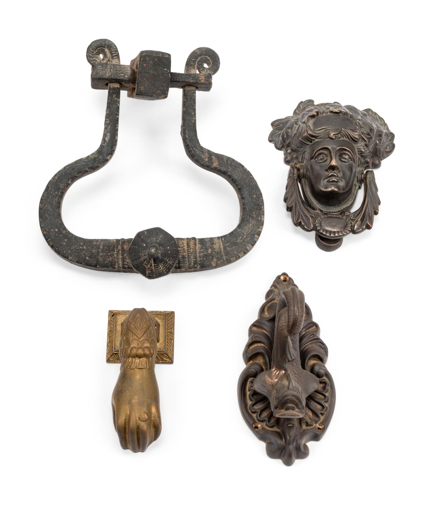 A Collection of Twelve Continental Bronze Door Knockers