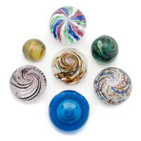 A Collection of Glass Paperweights Diameter of largest 3 inches