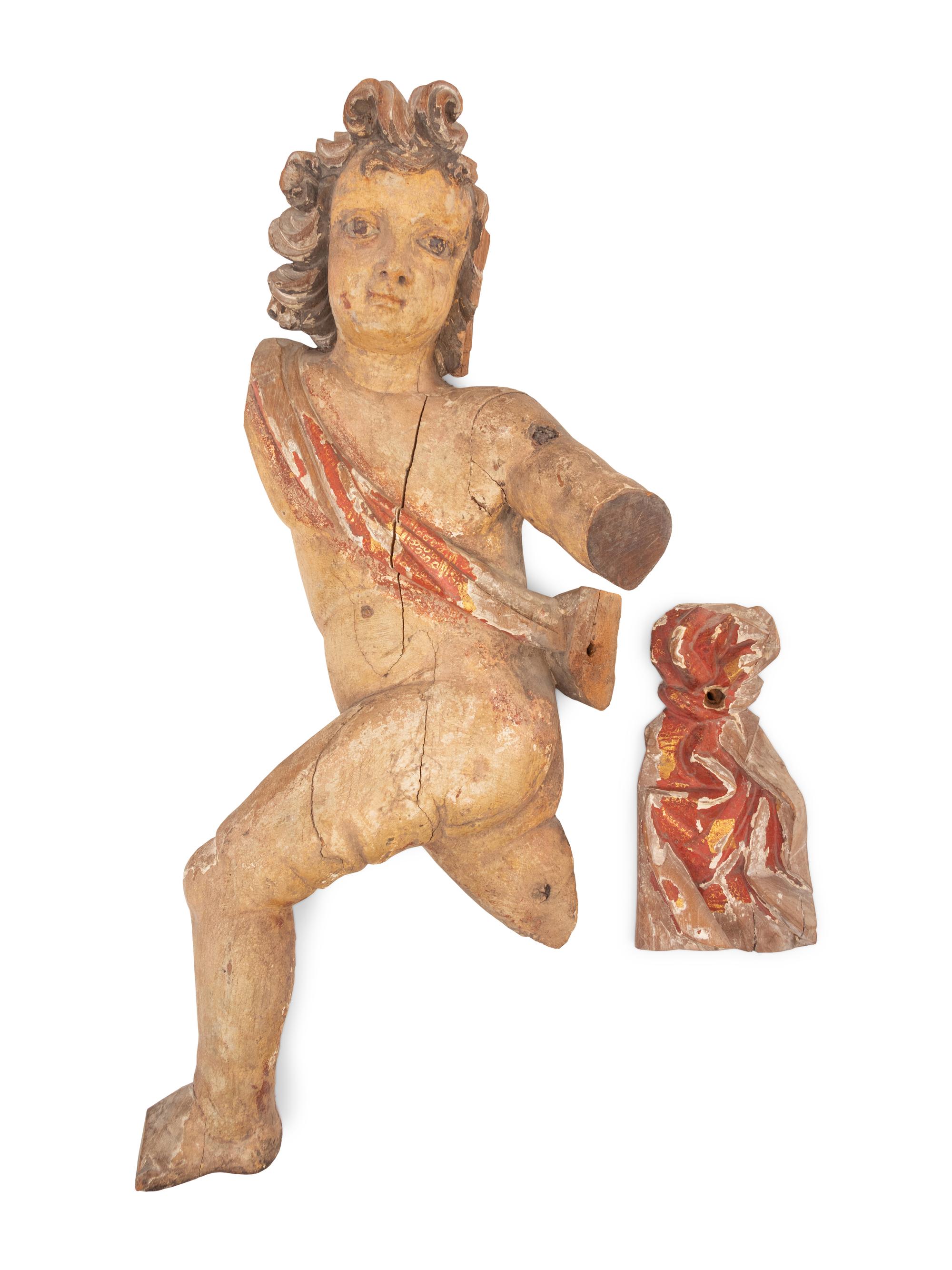 A Spanish Colonial Painted Figure of a Draped Putto
