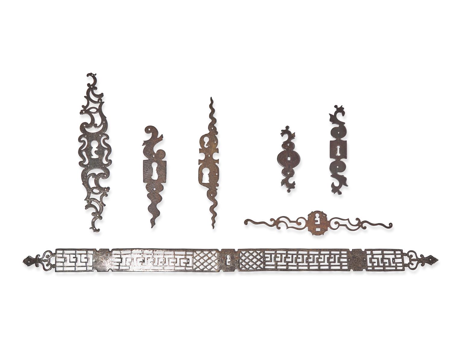 A Collection of Seven Wrought Iron Escutcheons, French, 18th and 19th Century