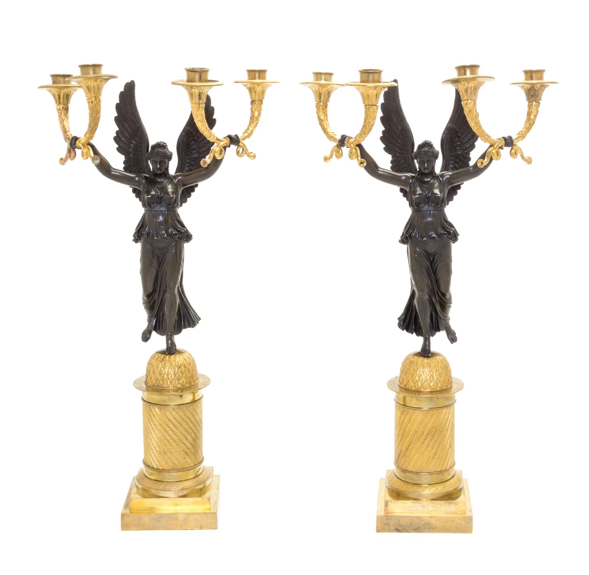 A Pair of Empire Gilt and Patinated Bronze Four-Light Candelabra Height 24 1/2 inches. — CLAUDE FRANCOIS RABIAT, FIRST QUARTER 19TH CENTURY