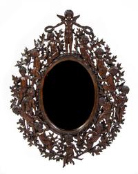 A Renaissance Revival Carved Oak Frame, Height 42 x width 32 1/2 inches.