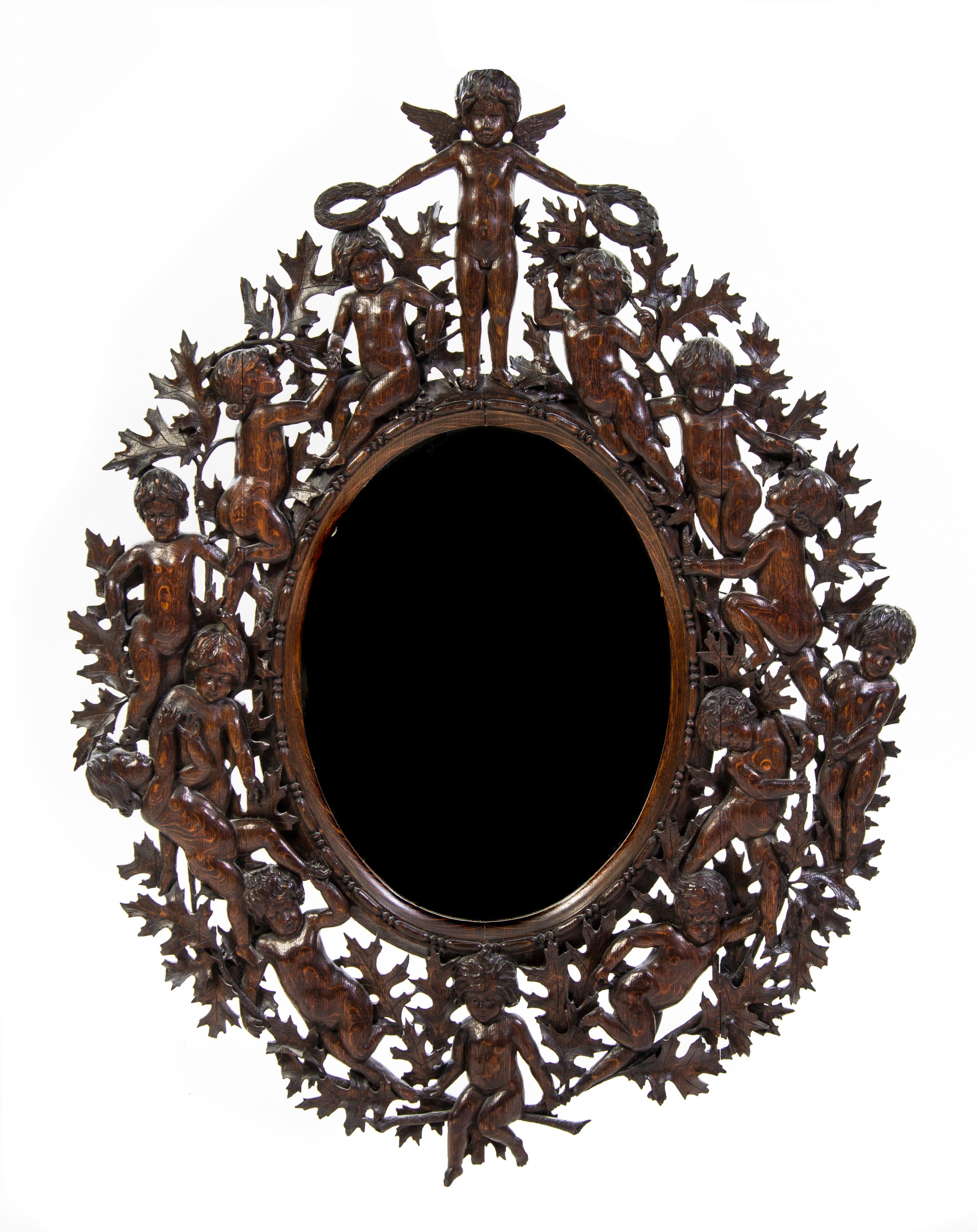 A Renaissance Revival Carved Oak Frame, Height 42 x width 32 1/2 inches.