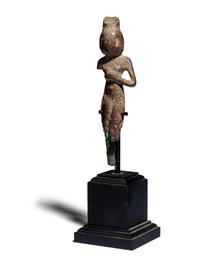 An Egyptian Bronze Concubine Holding a Duck