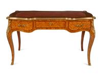 A Louis XV Style Gilt Bronze Mounted Parquetry Bureau Plat and Regency Style Parcel Gilt Chair