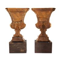 A Pair of Italian Giltwood Flat-Back Urns