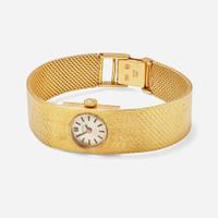An 18K Yellow Gold Ladies Tissot Watch