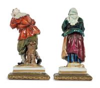 A Pair of Gilt Metal Mounted Porcelain Figures