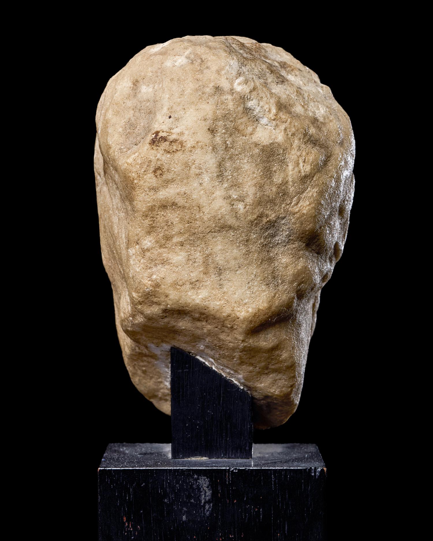 A Roman Marble Portrait Head of a Beaded Man
