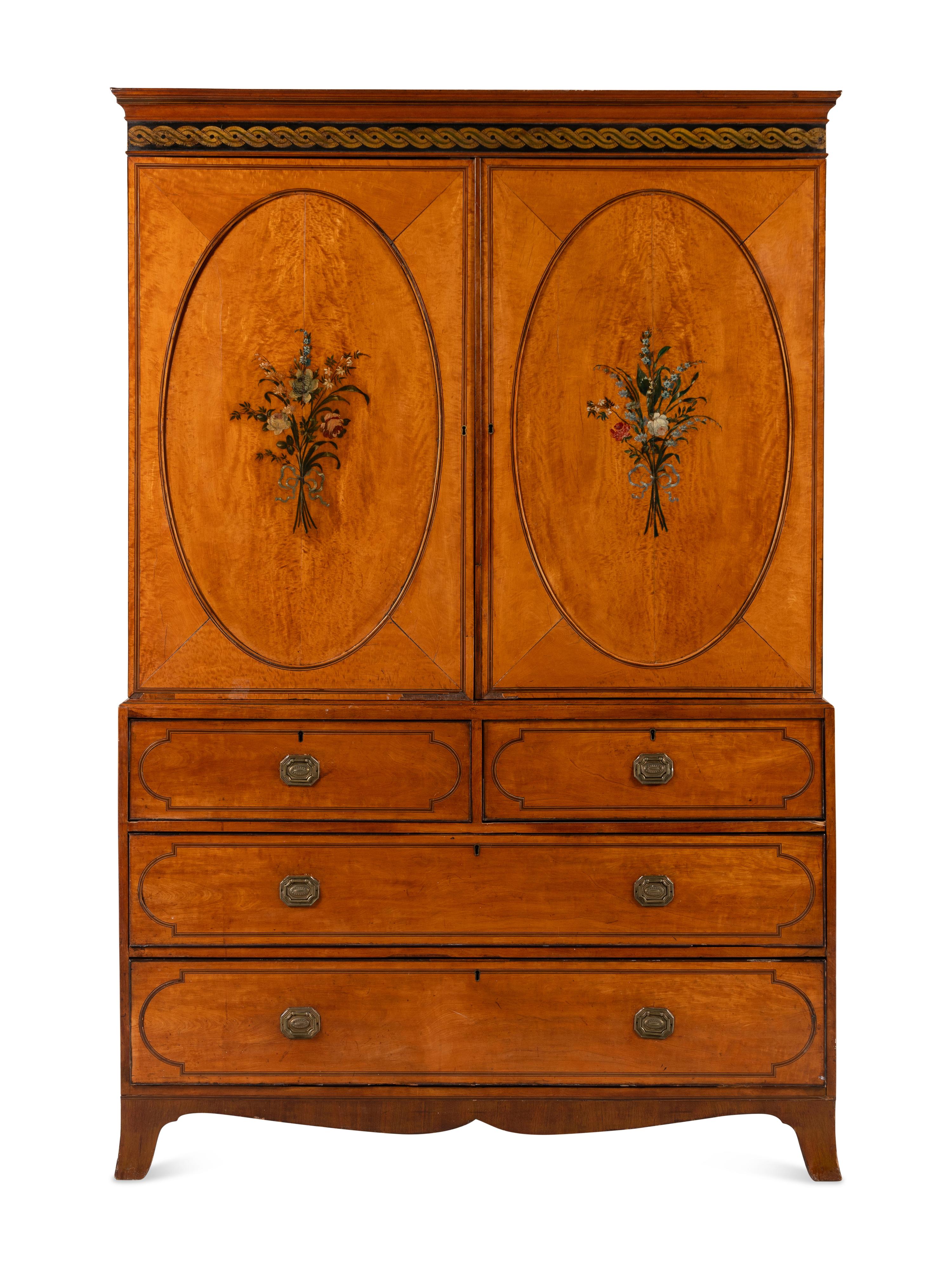 An Edwardian Painted Satinwood Linen Press