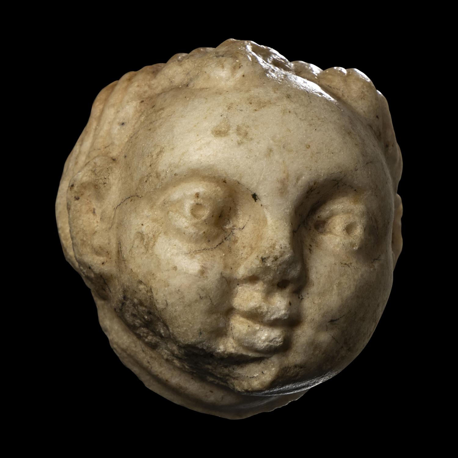 A Roman Marble Head of an Infant