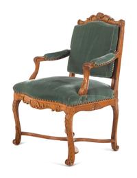 A Régence Style Velvet-Upholstered Beechwood Fauteuil