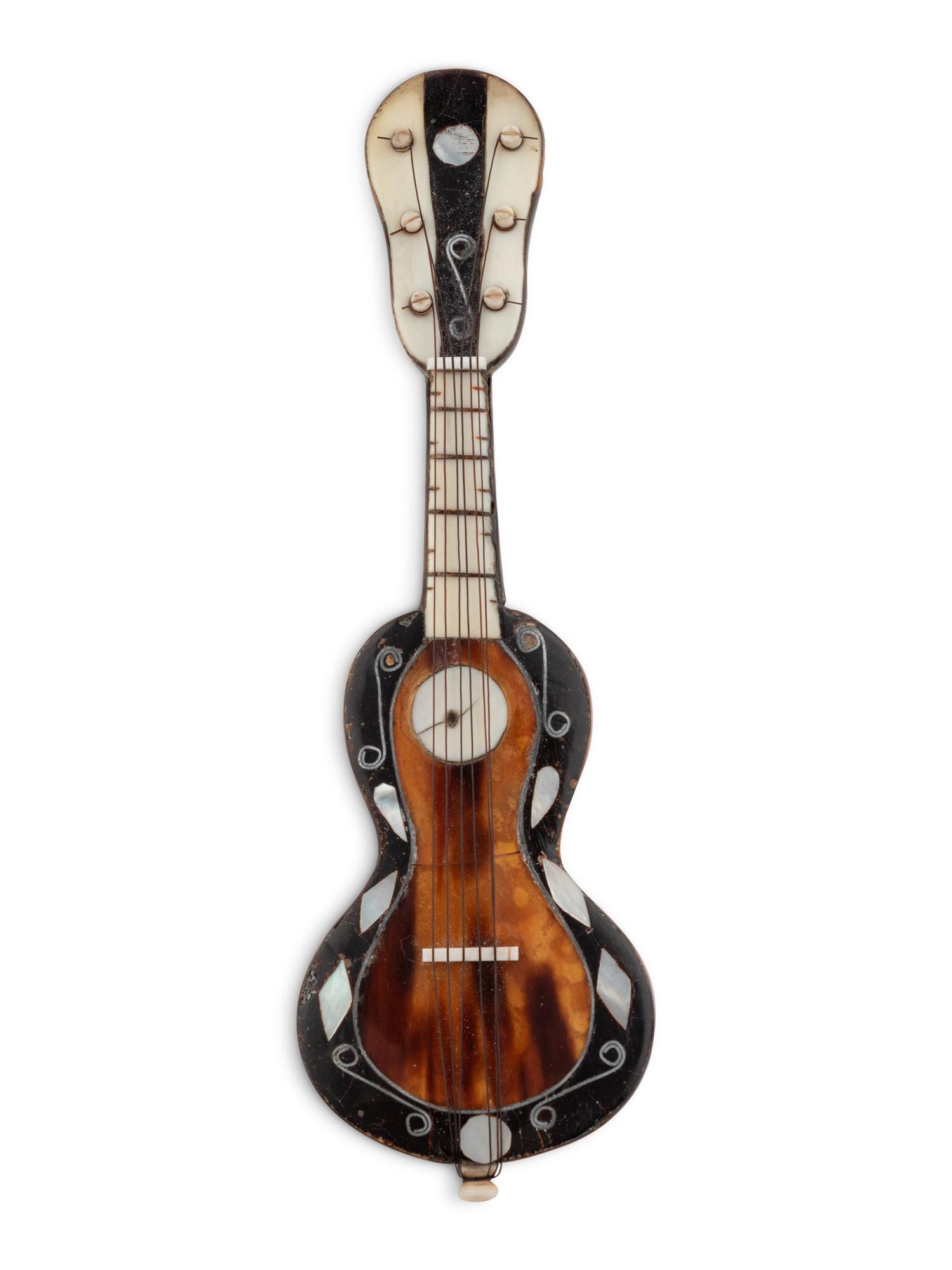 A Group of Three Continental Bone and Tortoise Shell Miniature Stringed Instruments