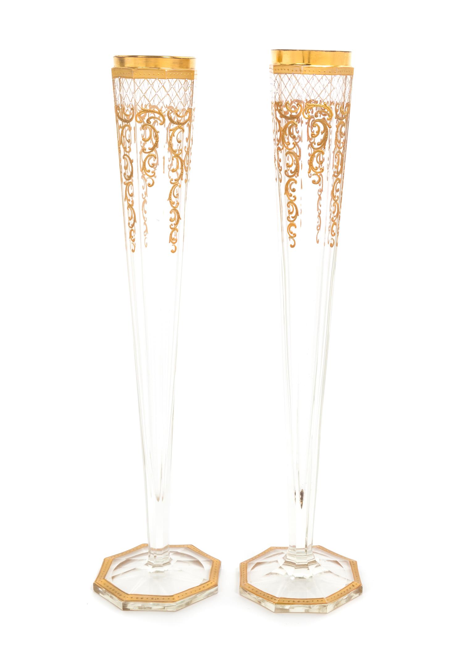 Moser, 19TH/20TH CENTURY, a pair of gilt decorated vases, each of tapering facetted form