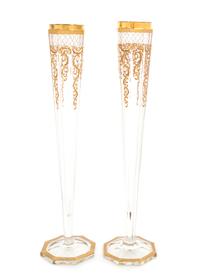 Moser, 19TH/20TH CENTURY, a pair of gilt decorated vases, each of tapering facetted form
