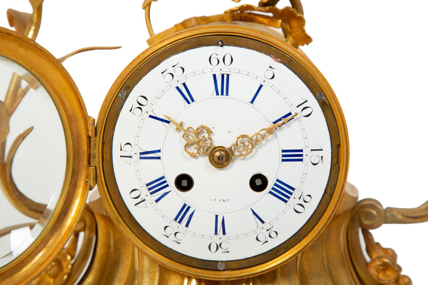 A Napoleon III Gilt Bronze Mantle Clock — 19TH CENTURY