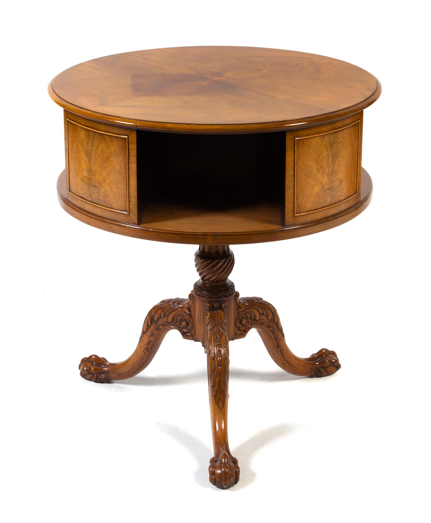 A Chippendale Style Walnut Drum Table Height 30 x diameter of top 28 inches. — CIRCA 1920
