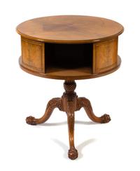 A Chippendale Style Walnut Drum Table Height 30 x diameter of top 28 inches. — CIRCA 1920