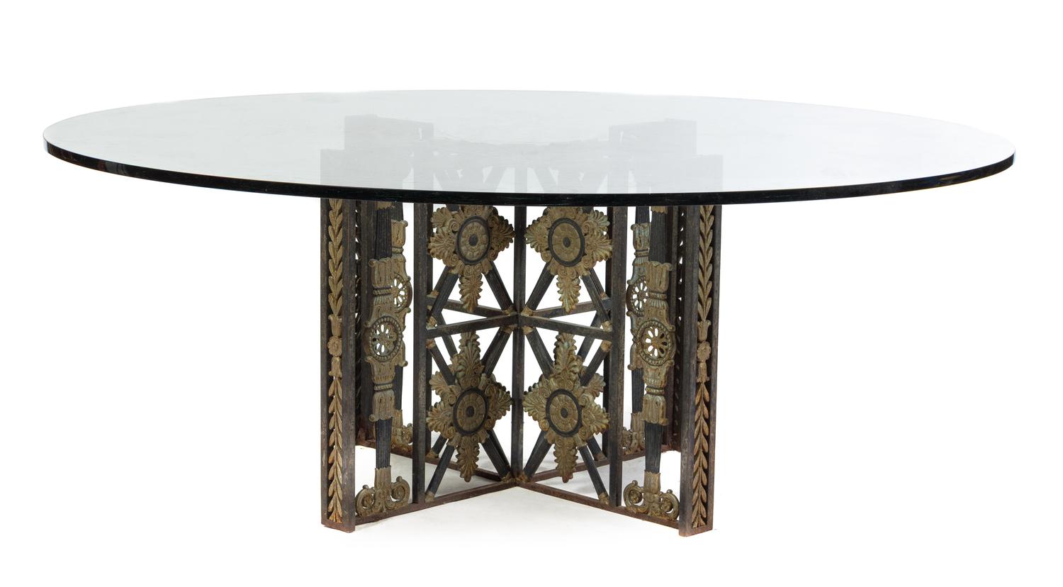 An American Cast Iron Table Base Height 30 x diameter of top 76 1/2 inches.