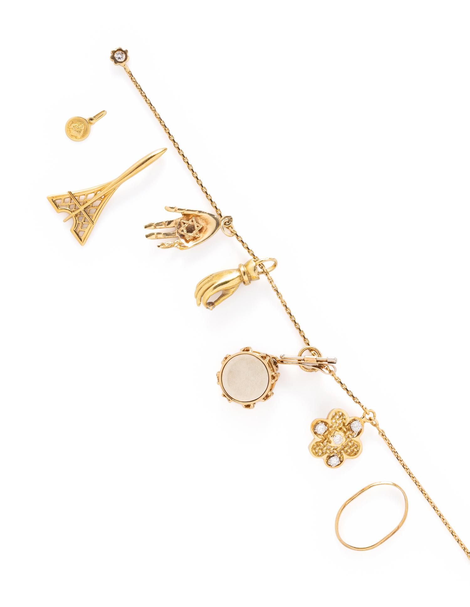 YELLOW GOLD CHARM BRACELET AND CHARMS