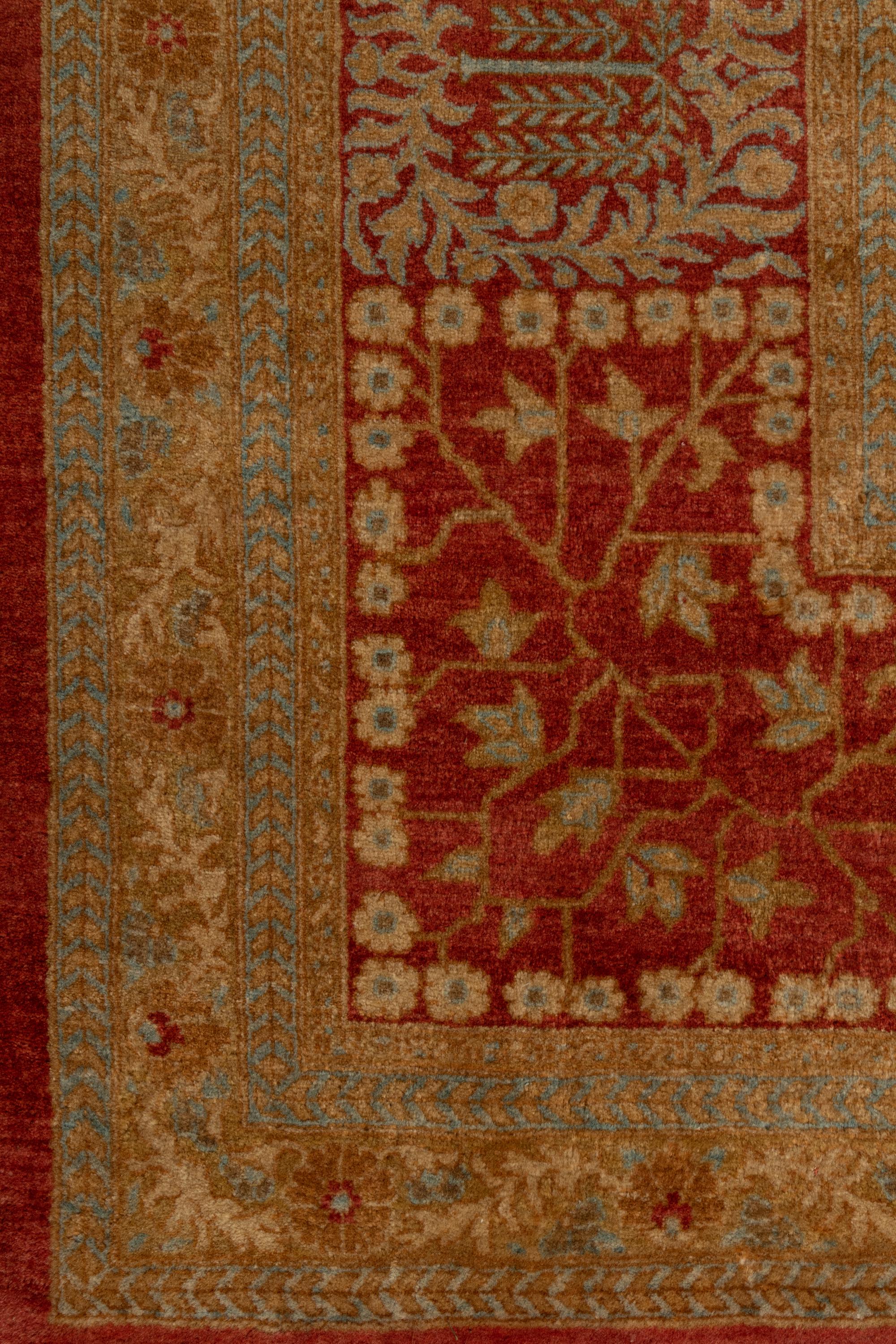 An Indo-Tabriz Wool Rug