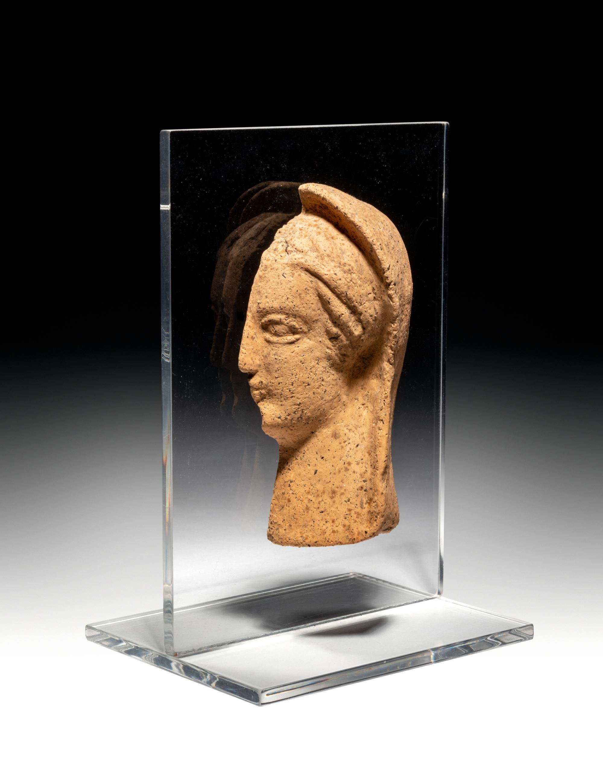 An Etruscan Terra Cotta Votive Half Head