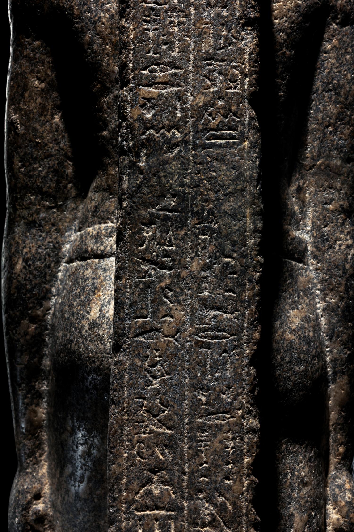 An Egyptian Granite Torso of an Official
