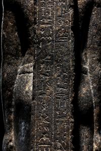 An Egyptian Granite Torso of an Official