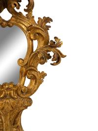 A Venetian Rococo Style Giltwood Mirror