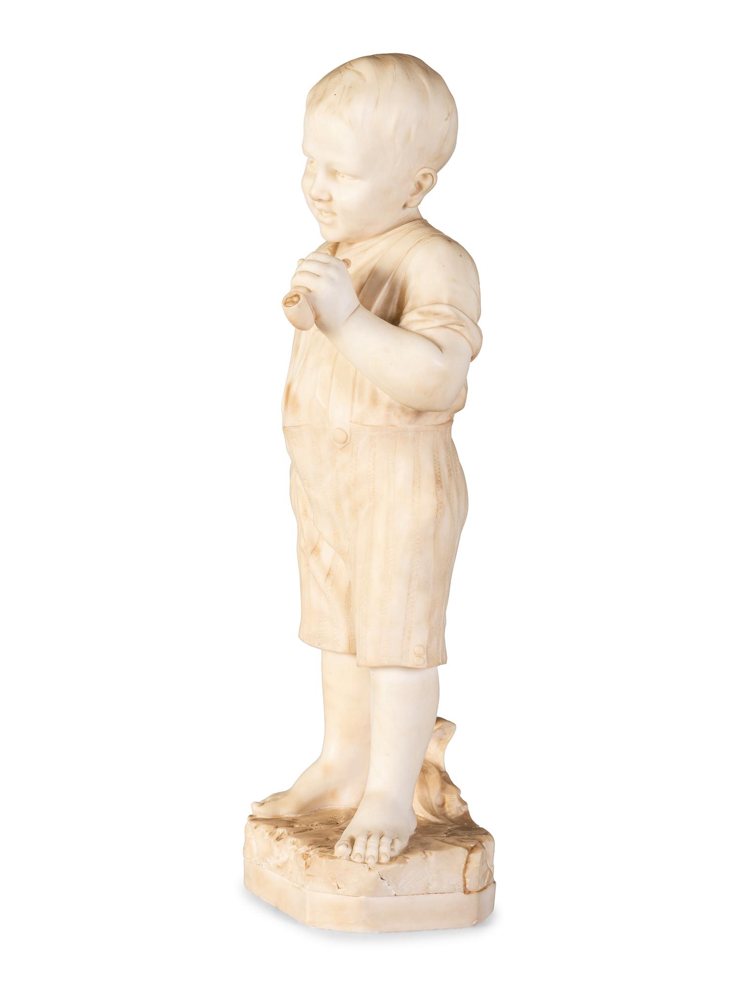 An Italian Carved Marble Figure of a Boy with Pipe