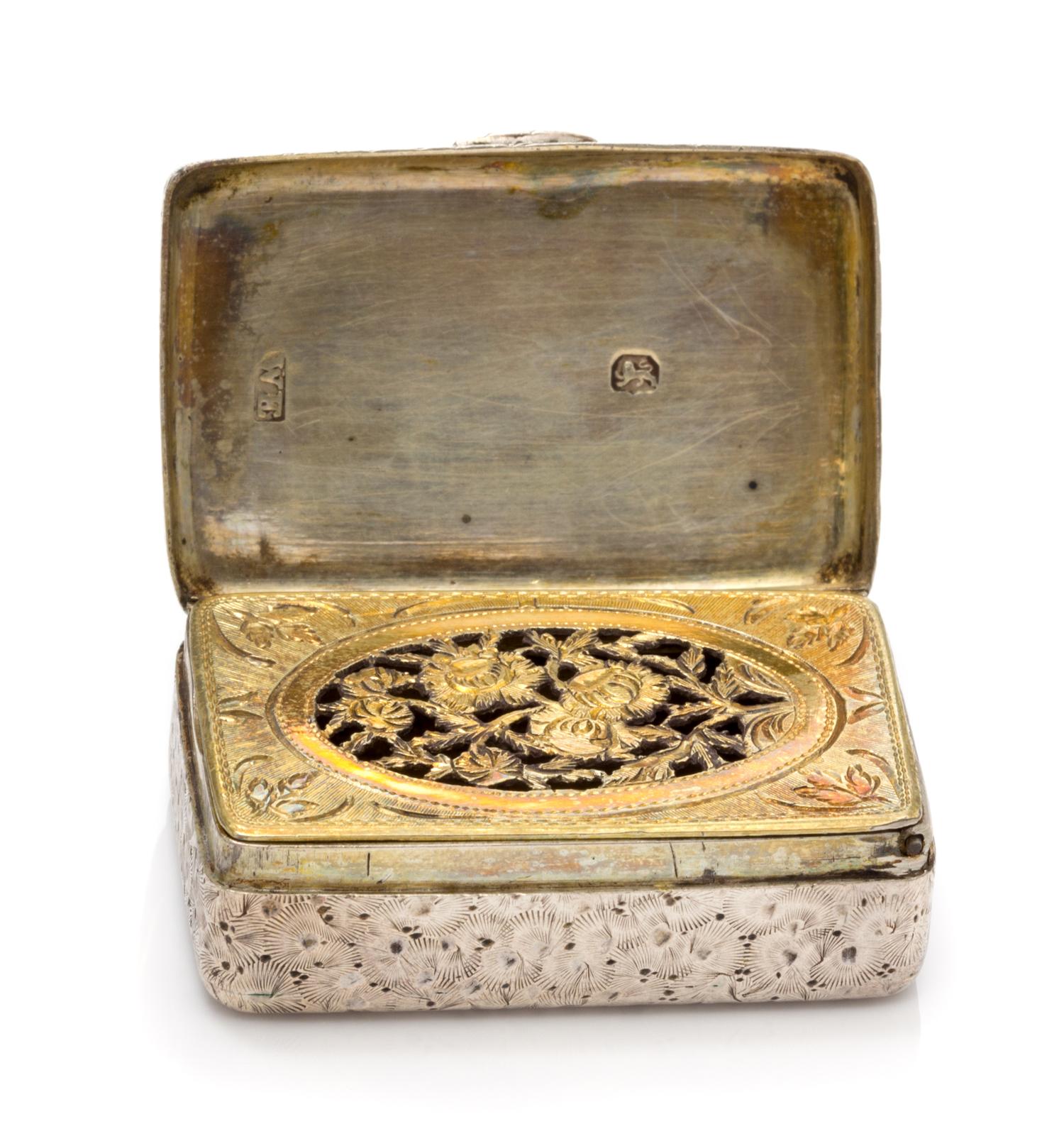 A George III Silver Vinaigrette, William Edwards, London, 1804, the case worked with floral decoration throughout, the lid centered by